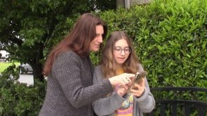 rylie and mom janie looking at their cell phone